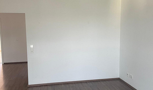 3-room apartment with balcony and parking space in a garage.