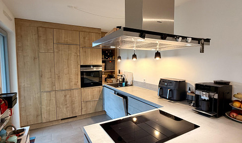 Exklusive 4-Zimmer-Wohnung mit Designerküche und Tiefgaragenstellplatz – Wohnen auf höchstem Niveau