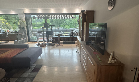 Spacious 3-room apartment with kitchen, hallway, balcony, and garden access, located in Viersen.