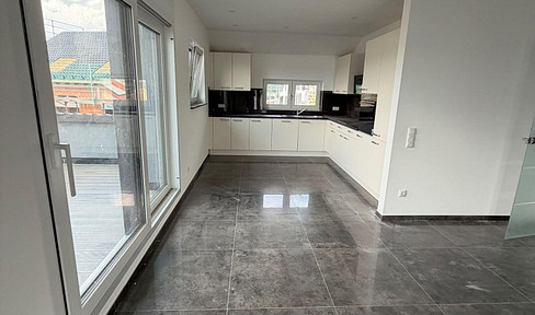 Modern, newly built 4-room apartment with fitted kitchen, balcony, and parking space in Rodenbach.