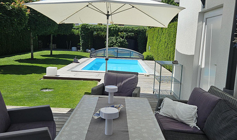 Brand new semi-detached house with a garden paradise, swimming pool, and sauna, located in the prestigious residential area near Wasserwald.