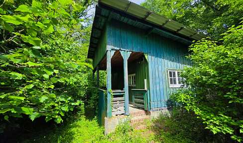 Enchanting: A historic cottage nestled within a private woodland retreat in the "Frau Holle" region.