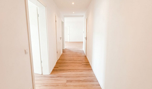 First occupancy! New, bright, and accessible 3-room ground-floor apartment with a garden, located in a central area of Jockgrim.