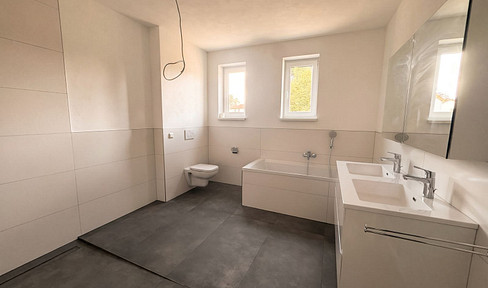 New, bright, and accessible 3-room ground-floor apartment with a garden, located in a very central area of Jockgrim.