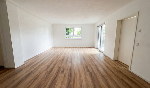 First occupancy! New, bright, and accessible 3-room ground-floor apartment with a garden, located in a central area of Jockgrim.
