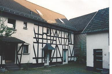 Fully let building - Detached house suitable for owner-occupation - with an ancillary building and a new garage.