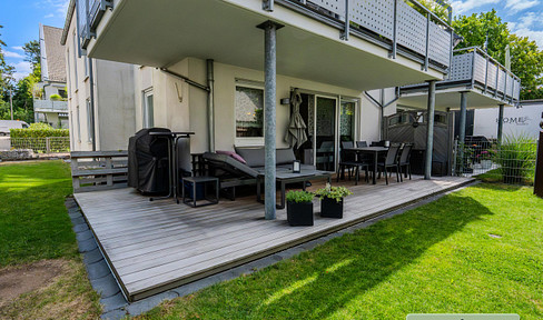 Erdgeschosswohnung mit großem Garten, sonniger Terrasse und zwei Tiefgaragenstellplätzen