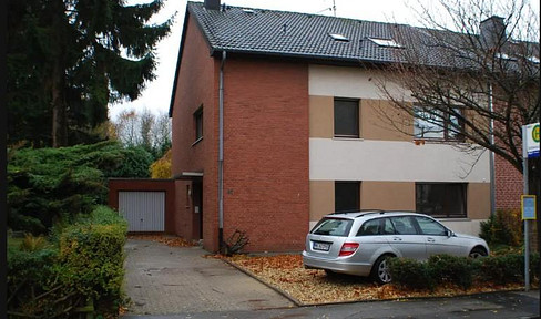 Großzügige Erdgeschoss Wohnung mit Garten und Garage