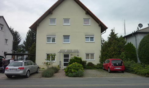 3-room apartment with kitchen, bathroom, and toilet, located on the 1st floor of a multi-family building in Pfungstadt.
