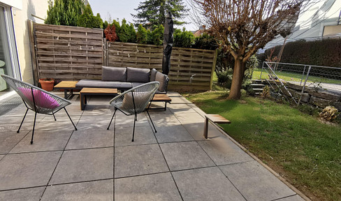 Modern terraced house with solar panels, heat pump, and smart home technology in Flein.