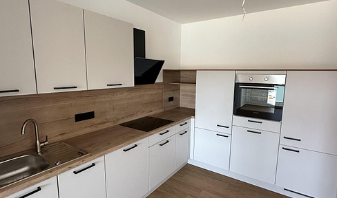 New construction - Never occupied before - Beautiful 2-room apartment including fitted kitchen and underground parking space!
