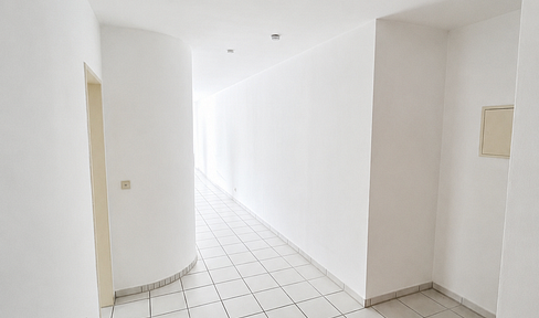 Renovated 3-room apartment with an open-plan living area, offering expansive views, and including a garage.