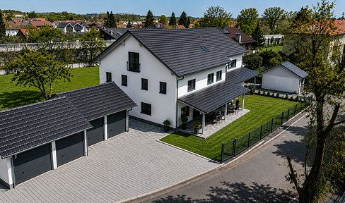 Exclusive newly built semi-detached house – featuring solar panels, electric vehicle charging station, air conditioning, and 2 garages – located in Ampfing.
