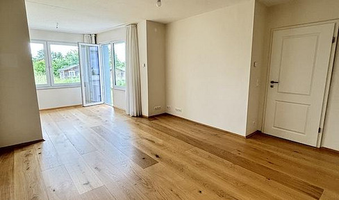 Luxus-EG-Wohnung m. Garten, Einbauküche, Garage und Parkplätzen