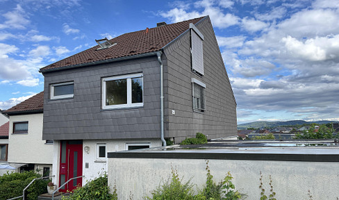 Terraced house with a rooftop terrace and panoramic views – a bright and spacious dream home for families.