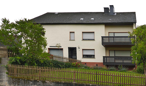 For sale by owner: Spacious, single-family house with a garden and outbuildings, offering potential for expansion.