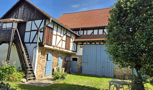 Spacious property with development potential, located in 35510 Butzbach-Ostheim (Wetterau district).
