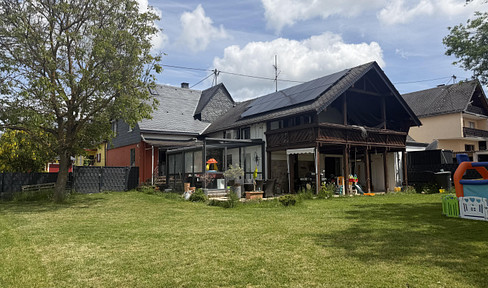 Commission-free: Modernized detached house with solar panels, smart home features, and a large garden.