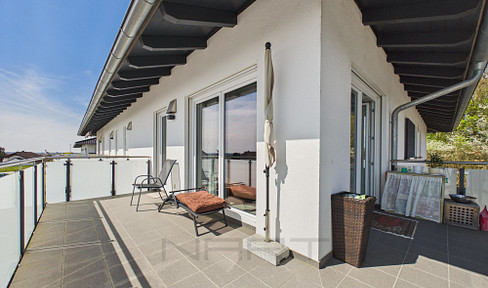 3-room apartment with a large south-facing balcony, underground parking, and exceptional privacy, located in Hengersberg.