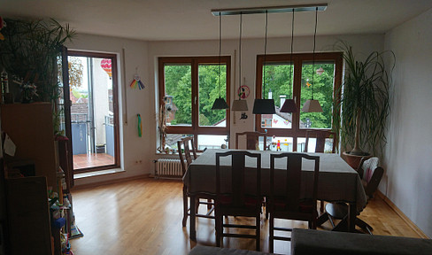 Bright 3-room apartment with two balconies, lake view, and panoramic mountain views.