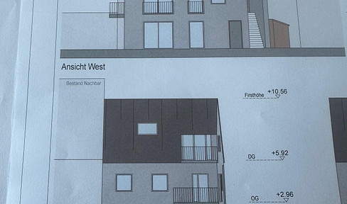 Land with building permit for 3 apartments.