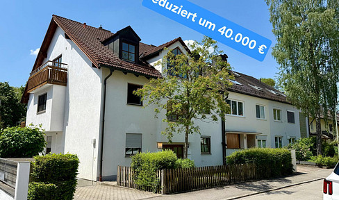 Exclusive attic apartment in a secluded location – 2 balconies – directly adjacent to the forest.