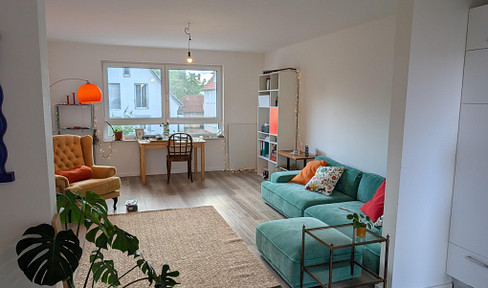 Moderne Neubauwohnung mit EBK, Balkon und A+ Energieeffizienz