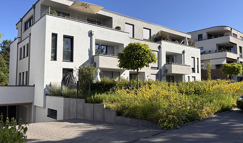 Modern 2.5-room apartment in a new building, located on the ground floor with a garden.