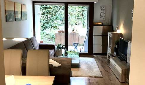 Einziehen und wohlfühlen! Gemütliche Wohnung mit überdachter Terrasse, EBK & Einzelstellplatz
