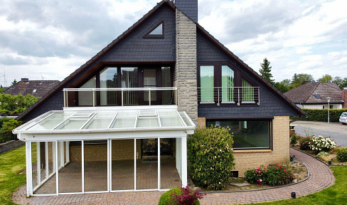 Exklusives Einfamilienhaus mit Panorama-Wintergarten, Sauna, Pelletheizung & Traumgarten in Melbeck