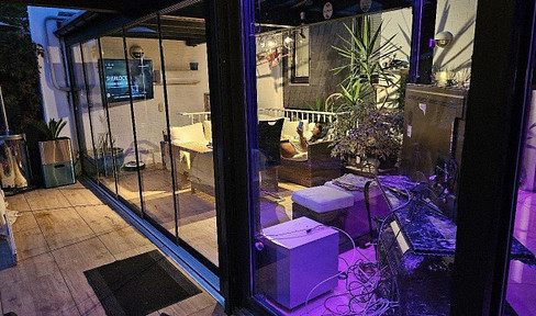 Modernized townhouse with solar panels, marble bathroom, and a summer garden.