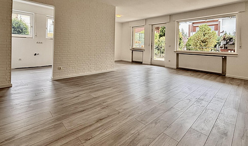 Live like you're in your own house – apartment with a garden, terrace, and garage in Dormagen-Delrath.