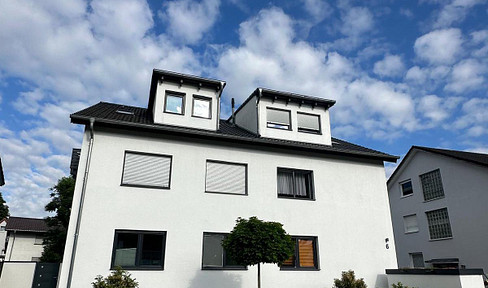 Modern 3.5-room apartment on the top floor with fitted kitchen and balcony.