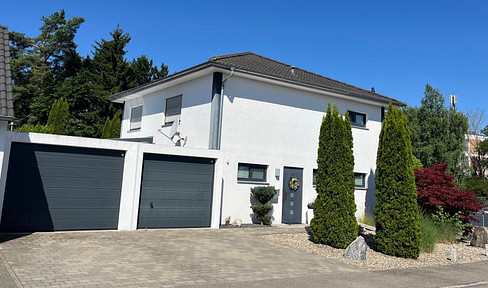 Modernes Einfamilienhaus mit Wintergarten, Doppelgarage und liebevoll angelegtem Garten in Schwendi