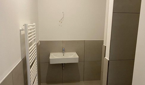 Modern 2-room ground floor apartment.