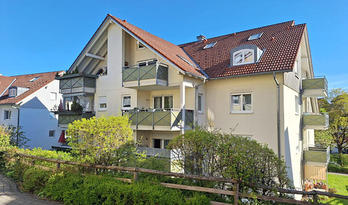 Spacious apartment with up to 6 usable rooms, 2 balconies, and a parking space in an underground garage.