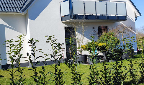 Neubauwohnung mit Balkon und Gartennutzung