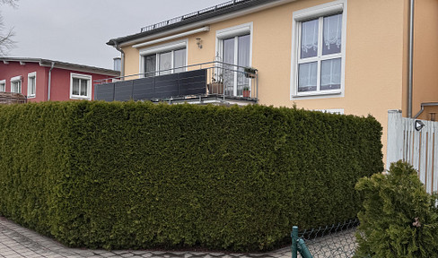 Luxurious 4-room apartment with a beautifully landscaped garden.