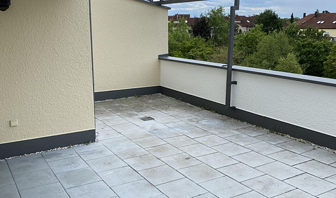Spacious 4-room apartment with a west-facing terrace, balcony, and underground parking.