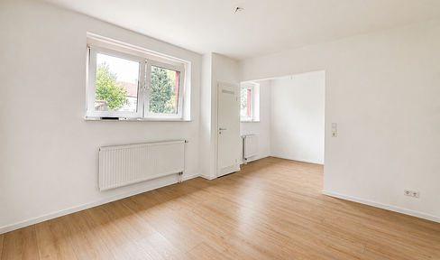 Bright, 2-room ground floor apartment.
