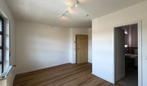 Modern living – recently renovated 1-bedroom apartment in Kaiserslautern with a balcony.