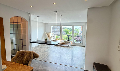 Spacious 3.5-room apartment with a south-facing balcony, garage, and newly renovated bathroom, located in Barop.