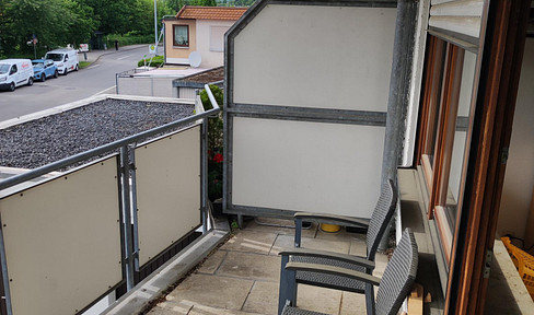 One-bedroom apartment with balcony.
