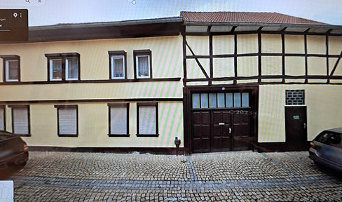 Timber-framed property with significant potential, located in the heart of the city.