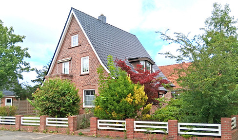 Zweifamilienhaus mit Werkstatt in zentraler Lage.