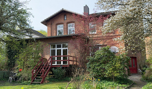 City villa in a green setting.