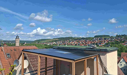 Large maisonette apartment with a spacious terrace, located in the city center of Ochsenfurt, near the market square, now available for rent.