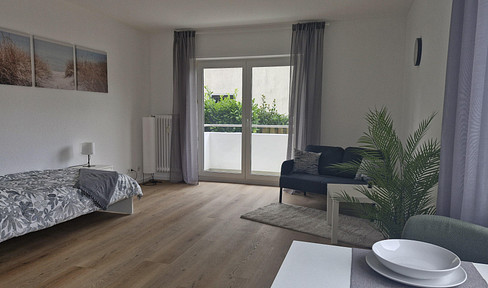 Furnished investment apartment with balcony and parking space – newly renovated, no commission.