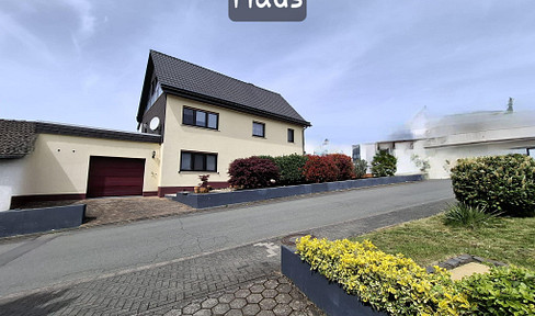 For sale by owner! A two-family house with a garage, additional building land, and numerous modernizations.