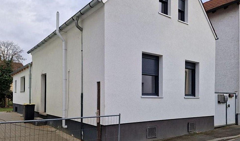 Completely renovated single-family house with a modern extension.